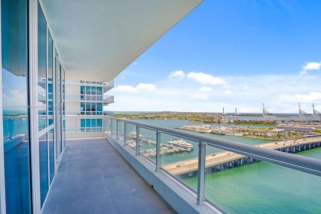 balcony featuring a water view