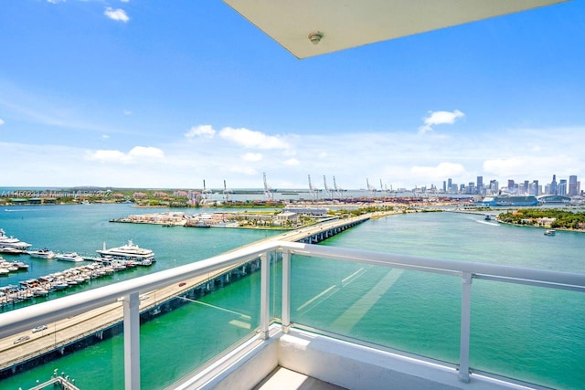 balcony featuring a water view