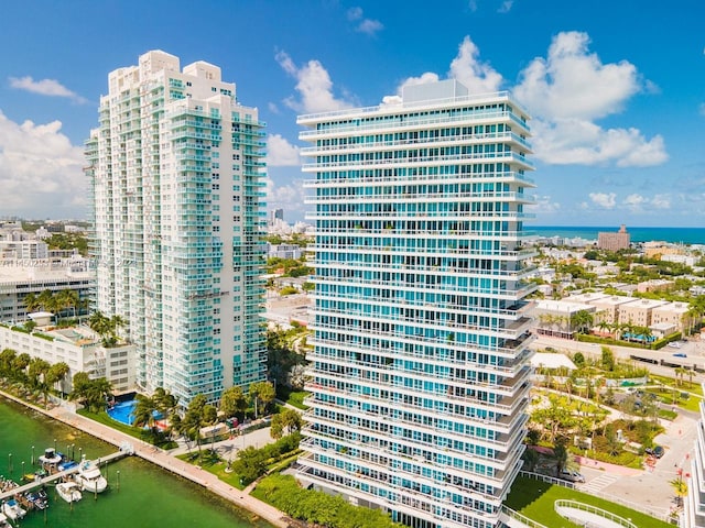 view of building exterior with a water view