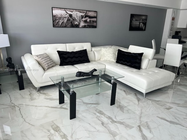 living room featuring light tile flooring