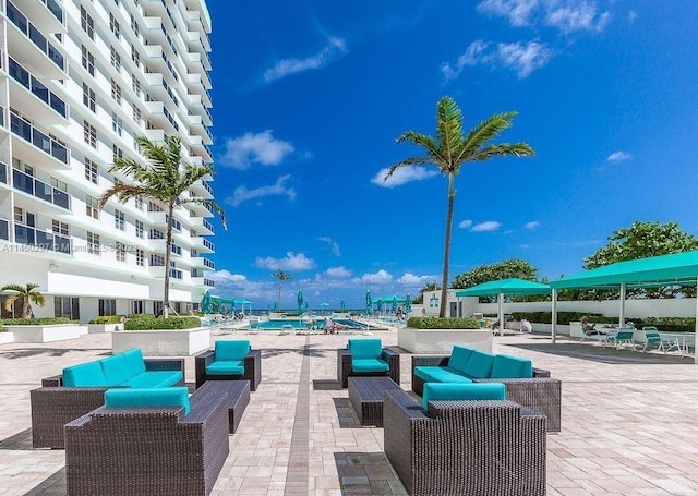 view of patio / terrace with a balcony and outdoor lounge area