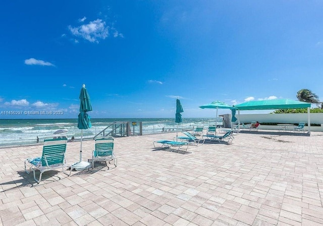 view of patio / terrace featuring a water view