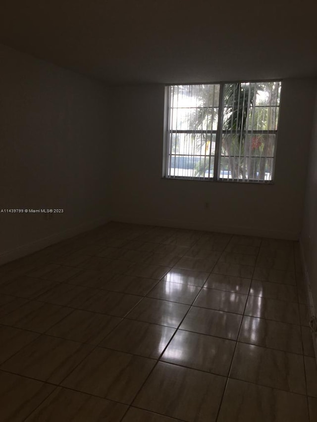 view of tiled spare room