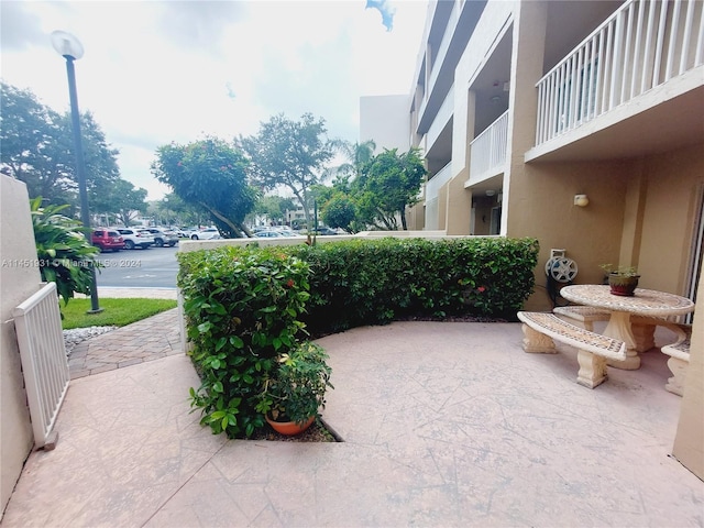 view of patio with a balcony