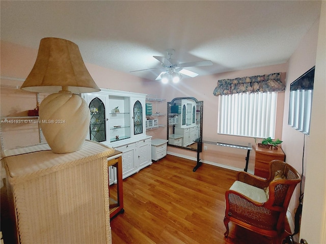 bedroom featuring ceiling fan and light hardwood / wood-style floors