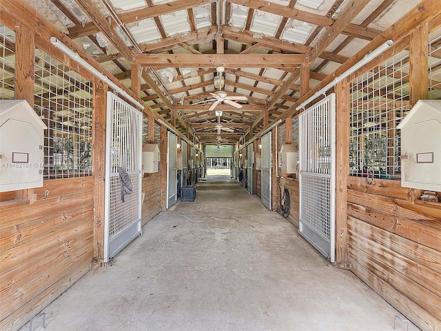 view of horse barn featuring an outdoor structure