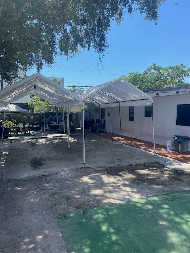 view of car parking featuring a carport