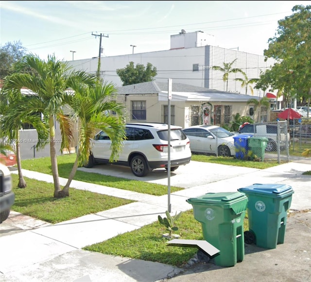 exterior space featuring a front yard and a playground