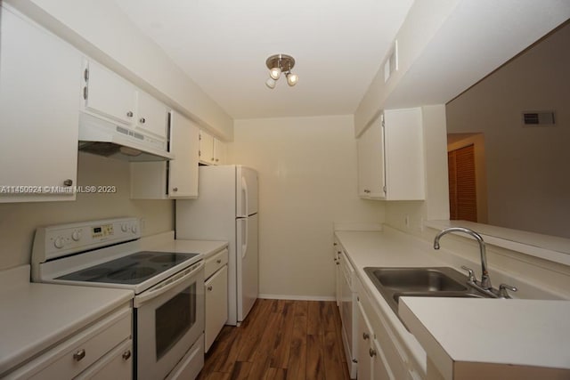 kitchen featuring dark hardwood / wood-style floors, white appliances, white cabinetry, and sink