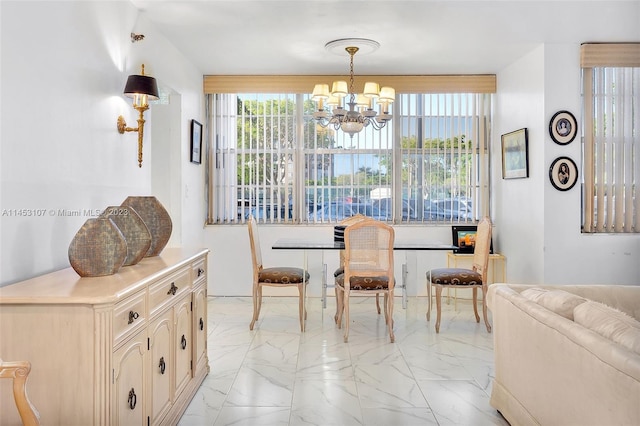 tiled dining space featuring an inviting chandelier