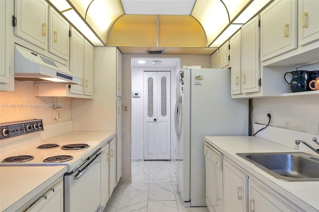 kitchen with light tile flooring, white appliances, and sink