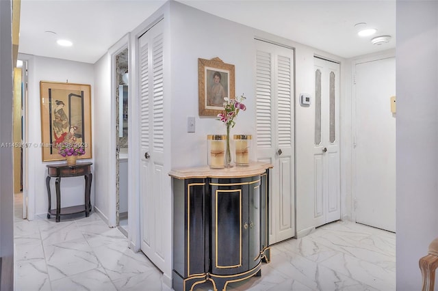 hallway with light tile floors