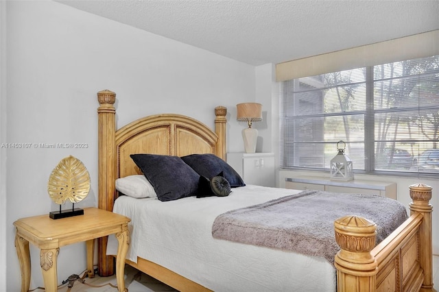 bedroom with a textured ceiling