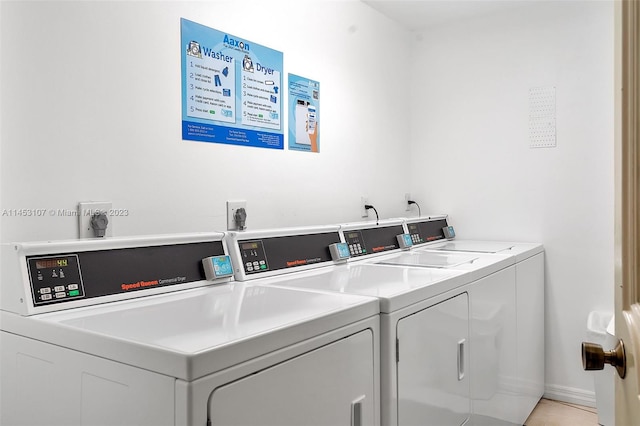 laundry room featuring washing machine and dryer and hookup for an electric dryer