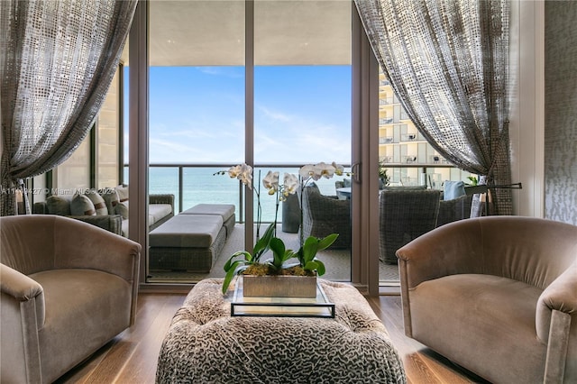 9705 Collins Ave Unit 1803N, Bal Harbour, FL 33154 - sunroom / solarium featuring a water view