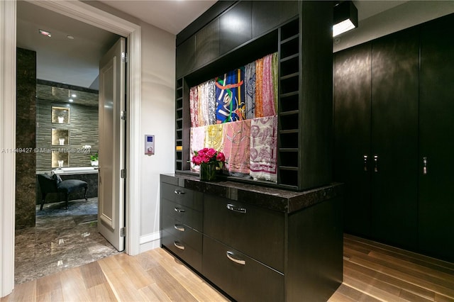 walk in closet featuring light wood-type flooring