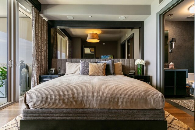 9705 Collins Ave Unit 1803N, Bal Harbour, FL 33154 - bedroom with wood finished floors