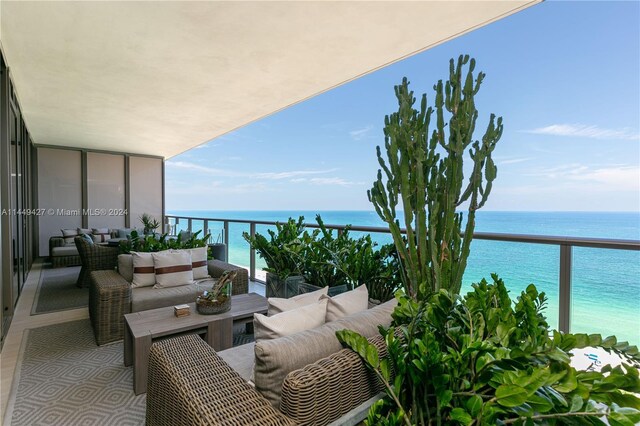 9705 Collins Ave Unit 1803N, Bal Harbour, FL 33154 - balcony with an outdoor hangout area and a water view