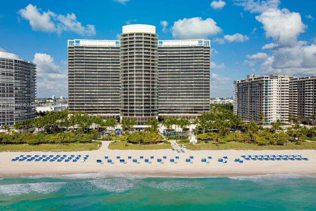 9705 Collins Ave Unit 1803N, Bal Harbour, FL 33154 - view of swimming pool featuring view of water and beach and a city view