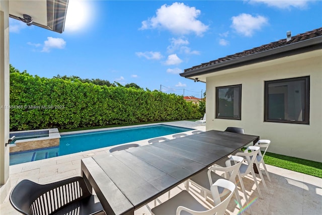 view of pool featuring a patio area