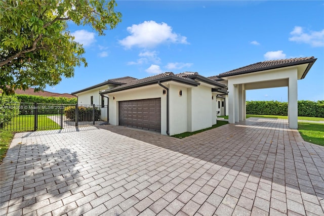 view of front of property with a garage