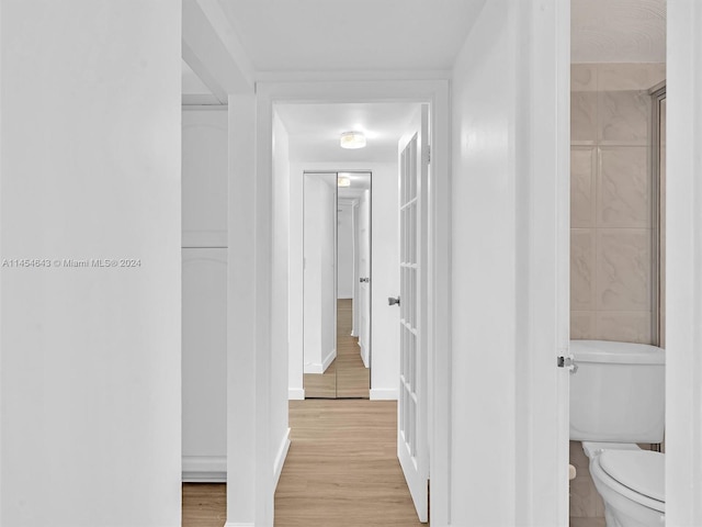 hall featuring light wood-type flooring