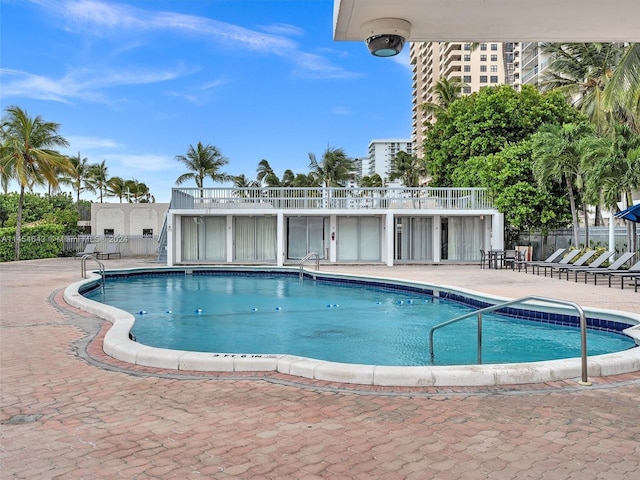 view of pool featuring a patio