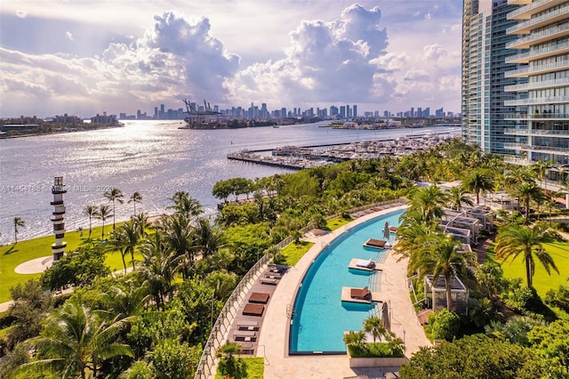 view of pool with a water view