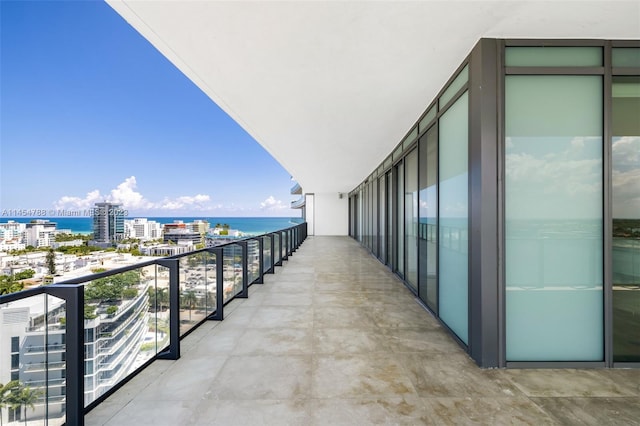 balcony featuring a water view