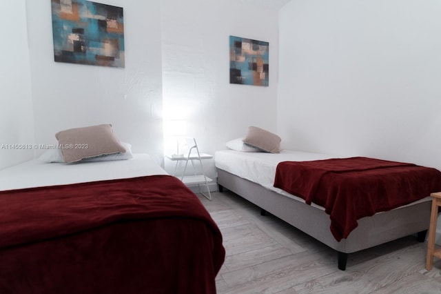 bedroom featuring light hardwood / wood-style floors