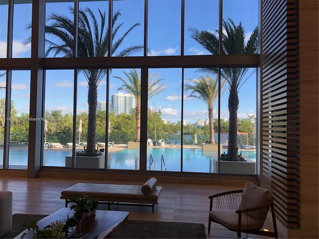16385 Biscayne Blvd Unit 1417, North Miami Beach, FL 33160 - living room featuring dark hardwood / wood-style floors and a healthy amount of sunlight