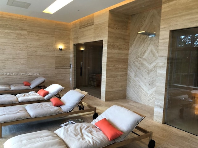 16385 Biscayne Blvd Unit 1417, North Miami Beach, FL 33160 - home theater room featuring tile walls