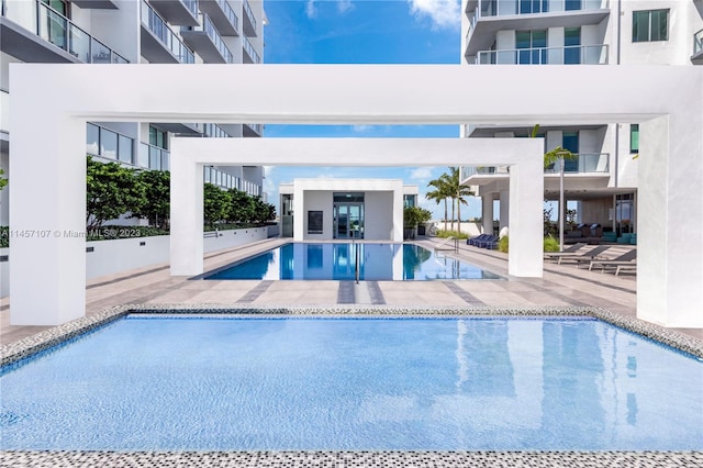 view of pool with a patio area