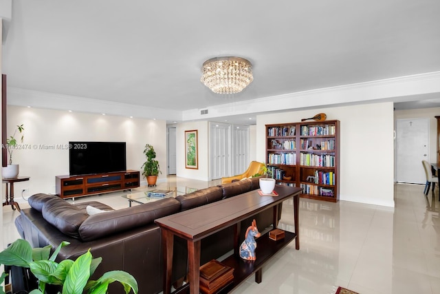 tiled living room featuring a chandelier