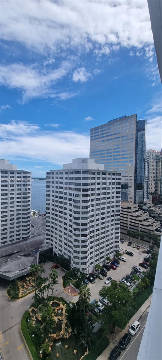 view of building exterior featuring a water view