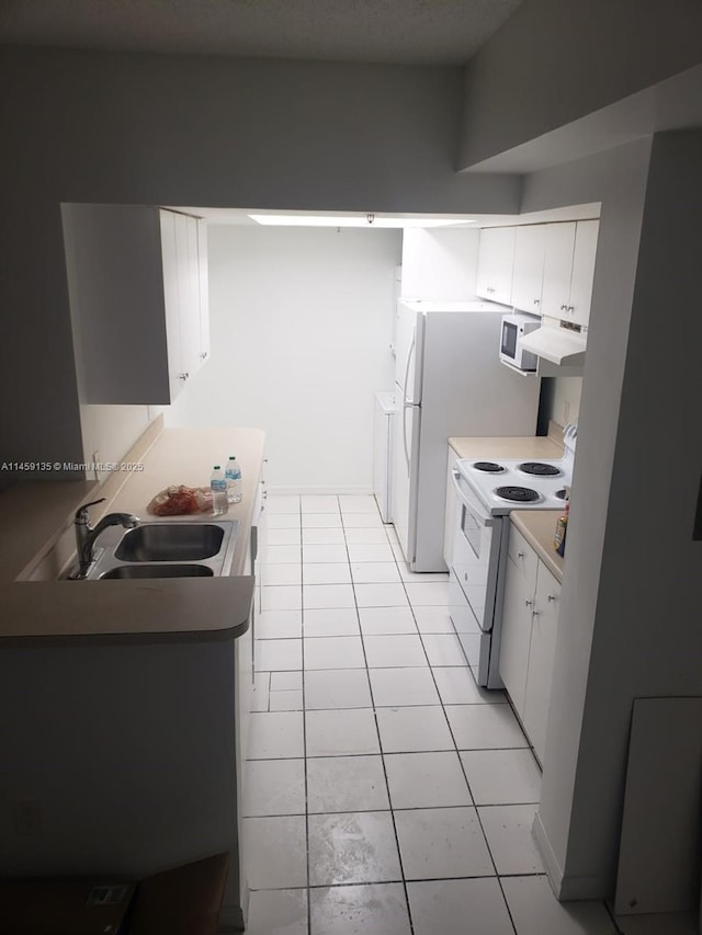 kitchen featuring electric stove, sink, ventilation hood, white cabinets, and light tile patterned flooring