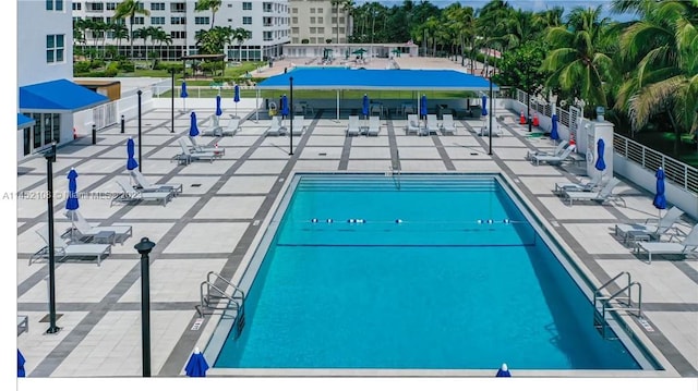 view of swimming pool featuring a patio