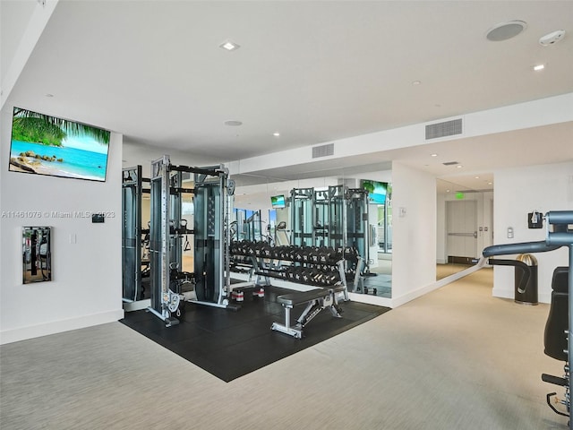 exercise room with carpet flooring