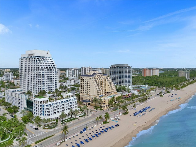 aerial view with a beach view and a water view