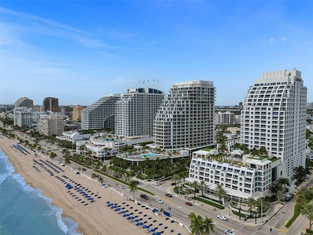 view of city with a water view and a beach view