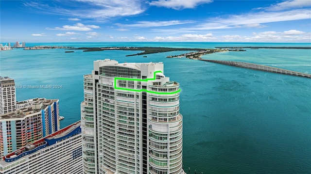 birds eye view of property featuring a water view