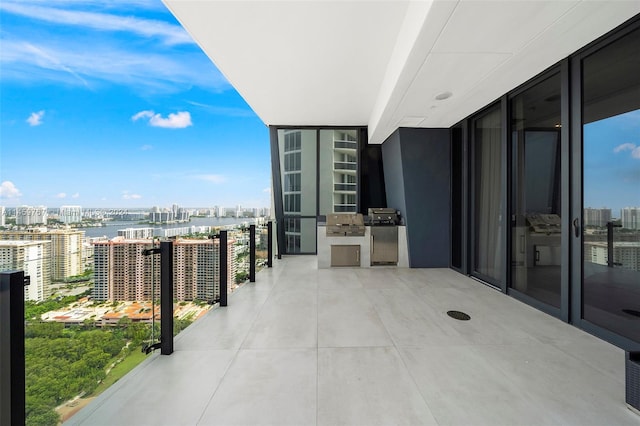 balcony featuring a water view