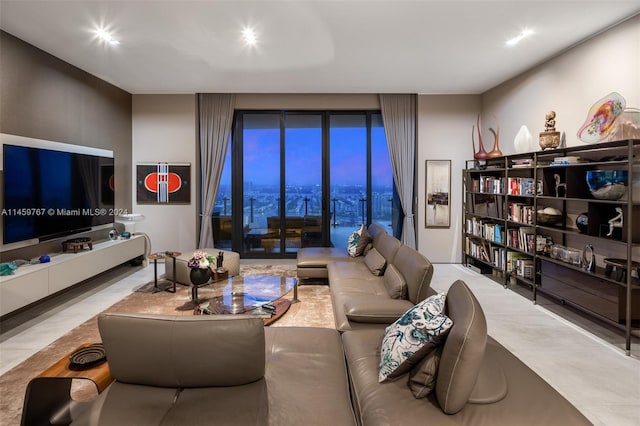 living room with a mountain view and light tile floors