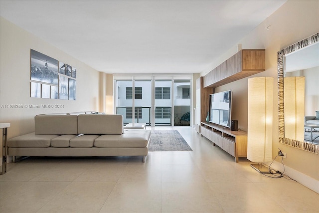 tiled living room with expansive windows