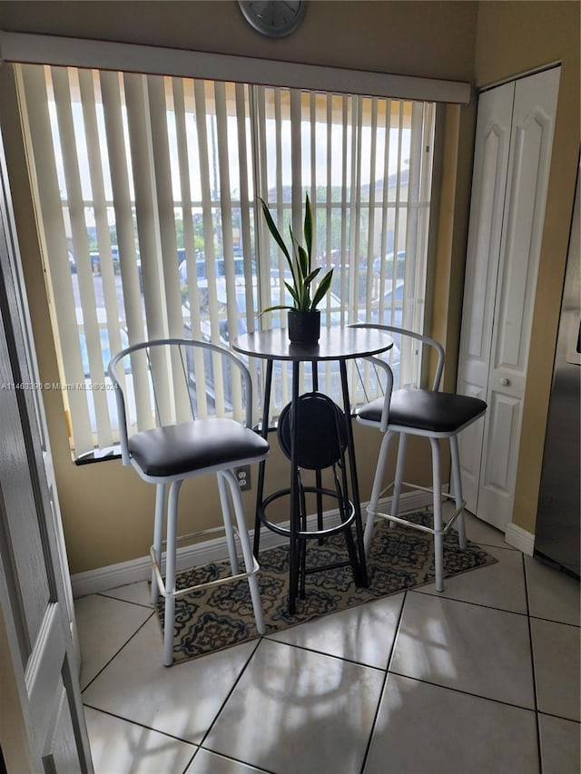 dining room with tile patterned floors