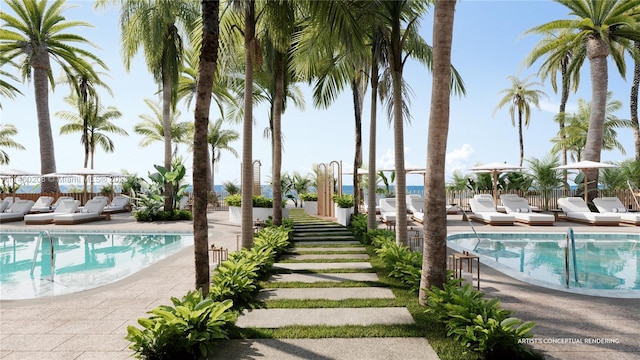 view of swimming pool with a patio area