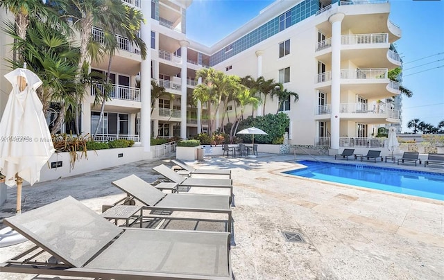 view of pool featuring a patio