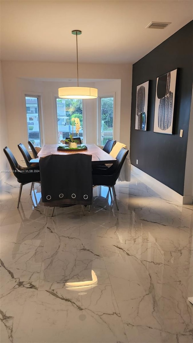 view of tiled dining area