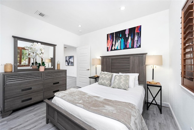 bedroom featuring light wood-type flooring