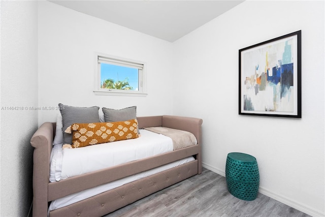 bedroom featuring light wood-type flooring